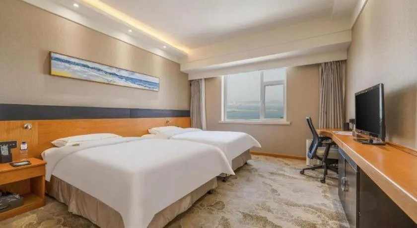 Bed in Yantai Bihai Hotel