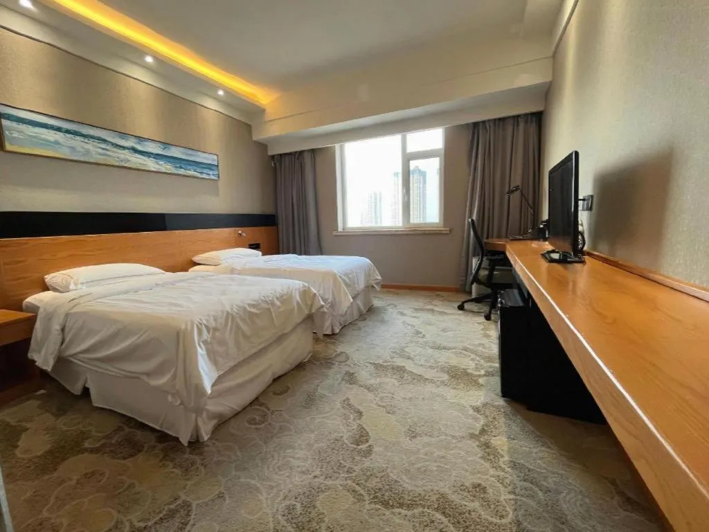 Bed in Yantai Bihai Hotel