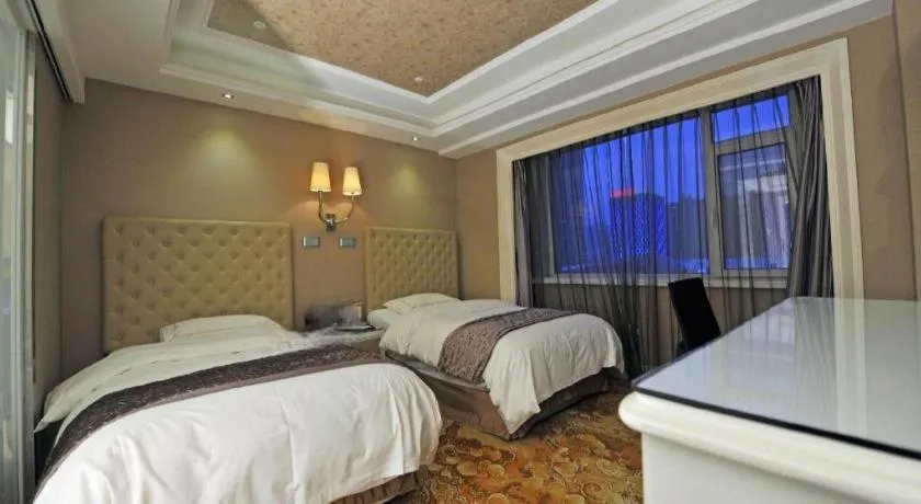 Bed in Yantai Bihai Hotel