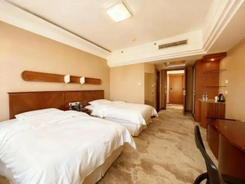 Bed in Yantai Bihai Hotel