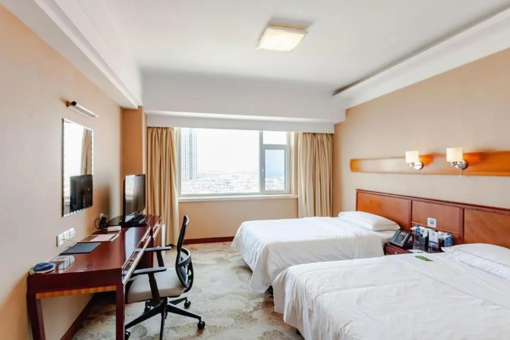 Bed in Yantai Bihai Hotel