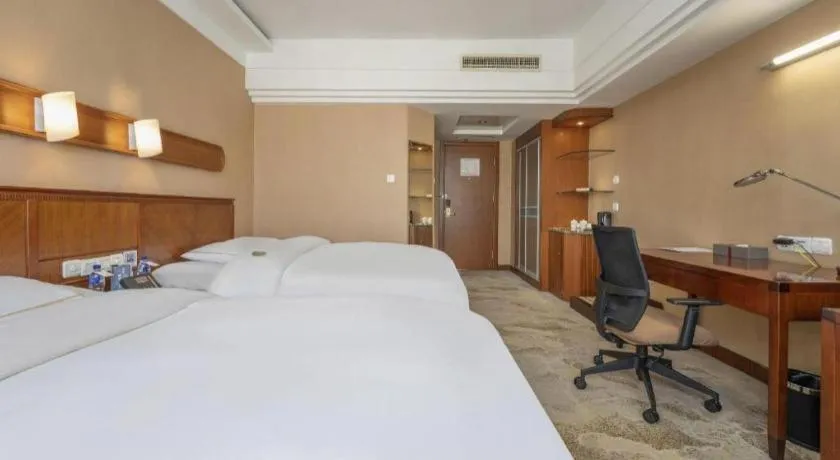 Bed in Yantai Bihai Hotel