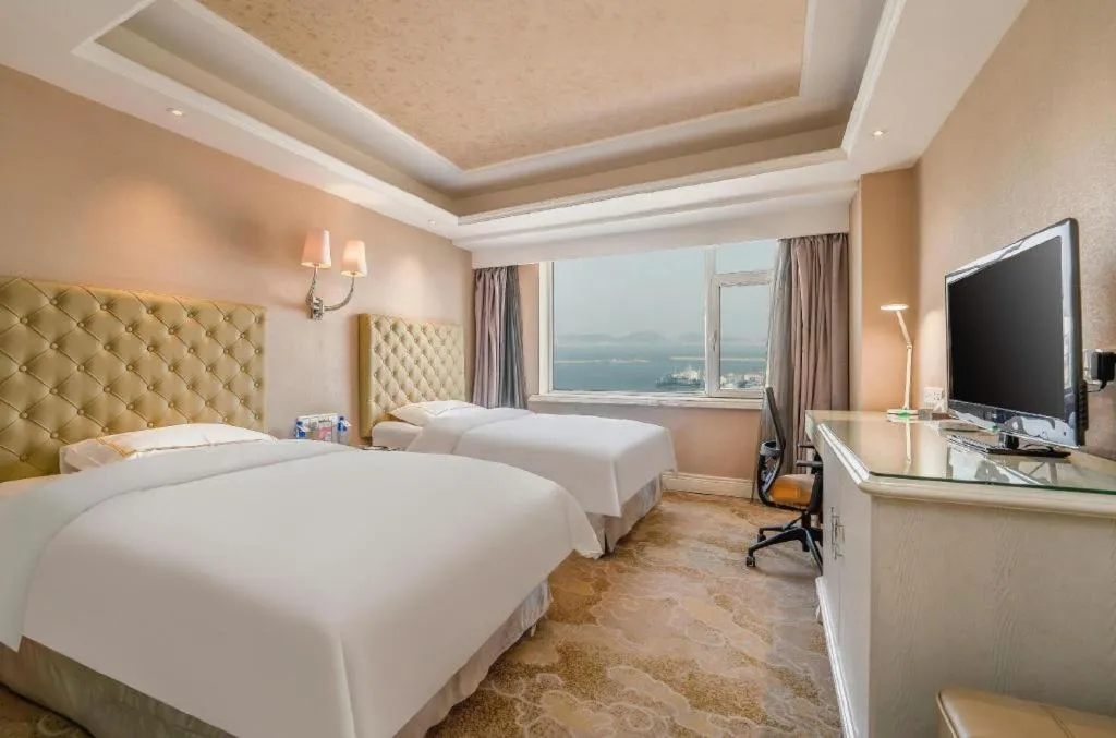 Bed in Yantai Bihai Hotel