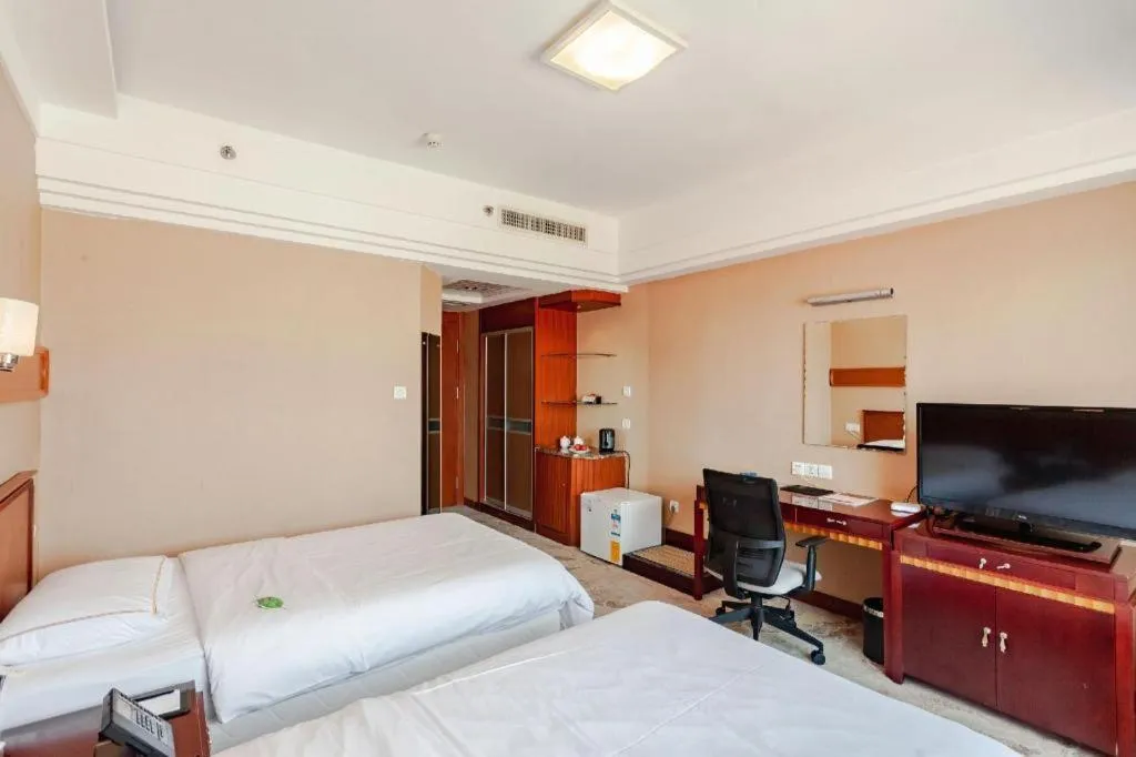 Bed in Yantai Bihai Hotel