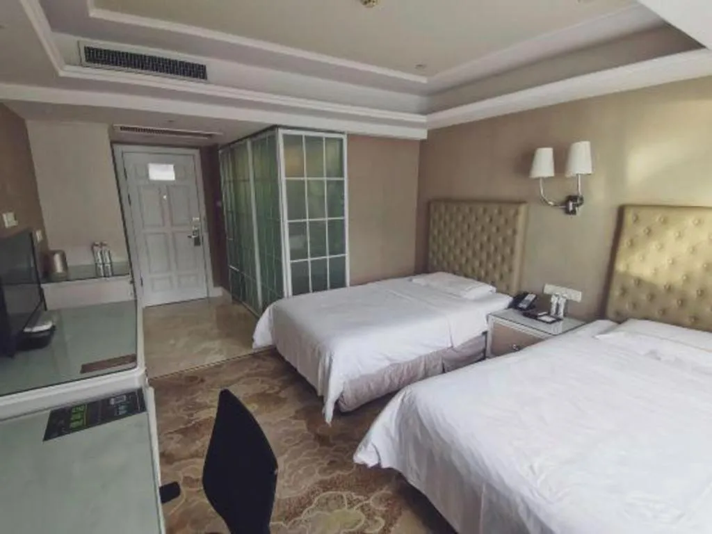 Bed in Yantai Bihai Hotel