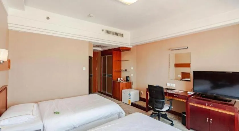 Bed in Yantai Bihai Hotel