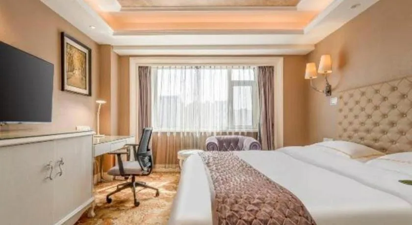 Bed in Yantai Bihai Hotel