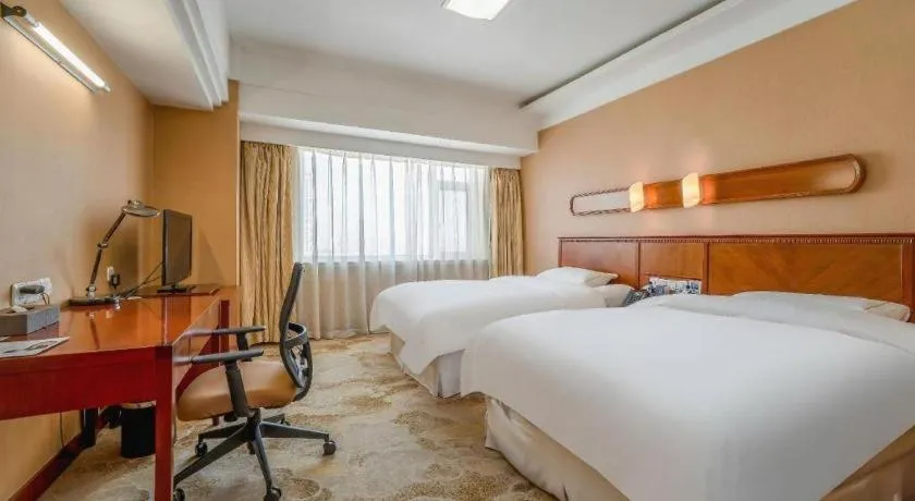 Bed in Yantai Bihai Hotel