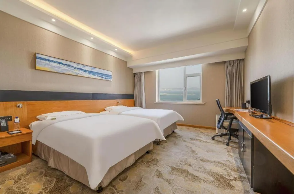 Bed in Yantai Bihai Hotel