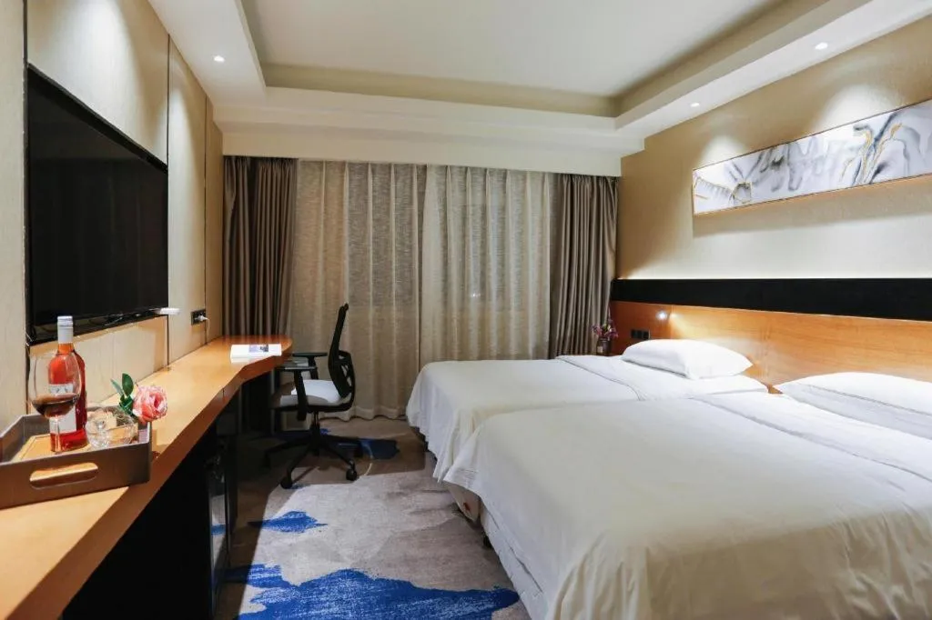 Bed in Yantai Bihai Hotel