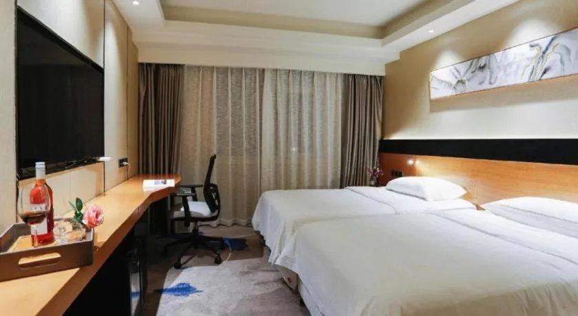 Bed in Yantai Bihai Hotel