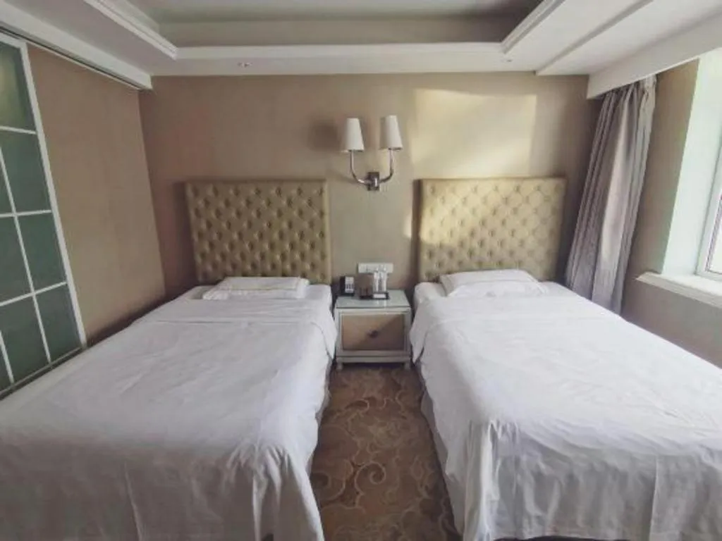 Bed in Yantai Bihai Hotel
