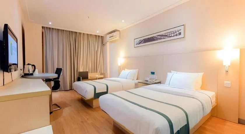 Bed in City Comfort Inn Guigang Tangren Street