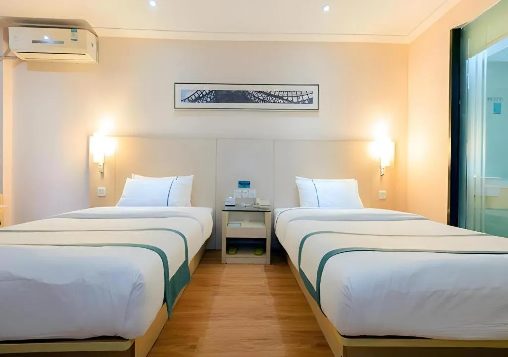 Bed in City Comfort Inn Guigang Tangren Street