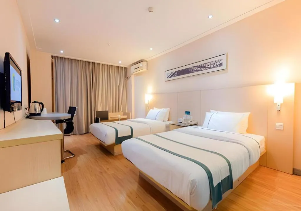 Bed in City Comfort Inn Guigang Tangren Street