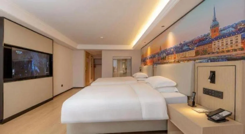Bed in Vienna International Hotel Guangzhou Huangpu