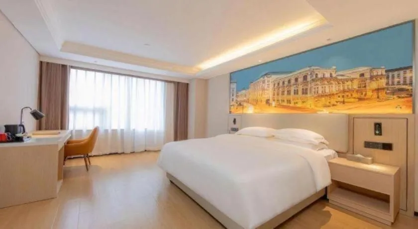 Bed in Vienna International Hotel Guangzhou Huangpu