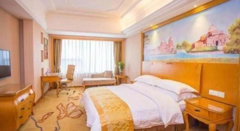 Bed in Vienna International Hotel Guangzhou Huangpu