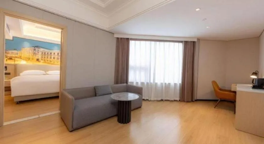 Bed in Vienna International Hotel Guangzhou Huangpu