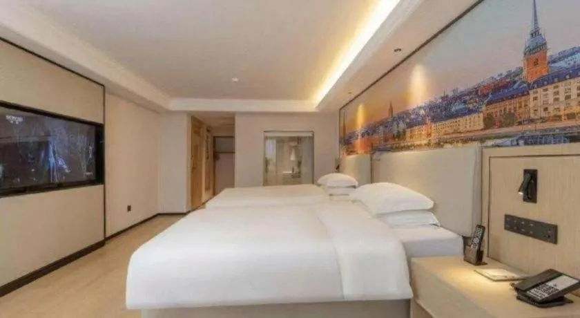 Bed in Vienna International Hotel Guangzhou Huangpu