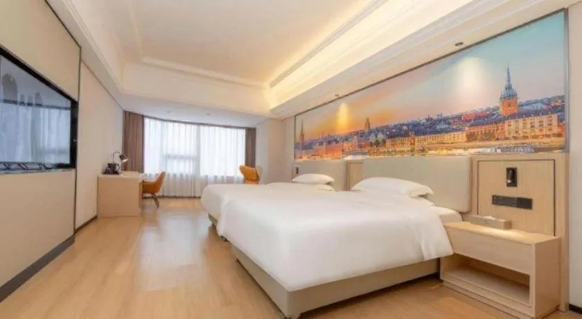 Bed in Vienna International Hotel Guangzhou Huangpu