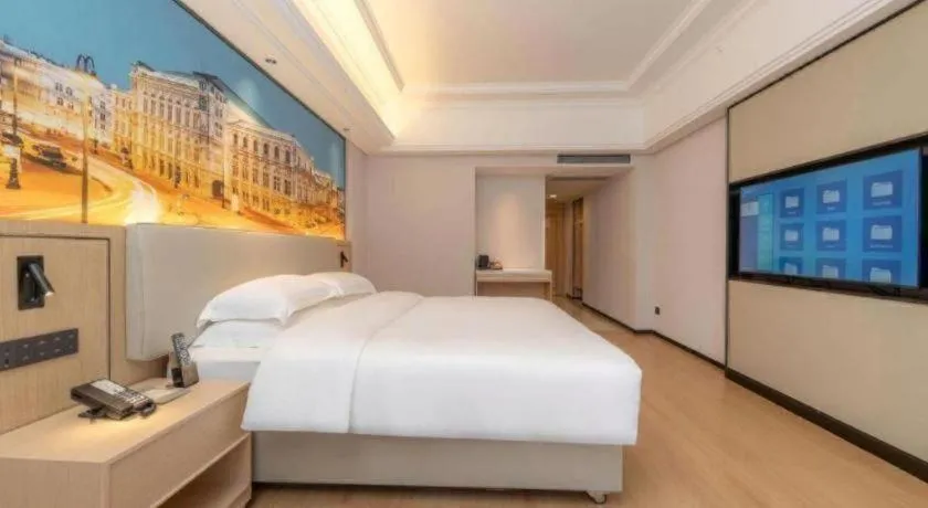 Bed in Vienna International Hotel Guangzhou Huangpu