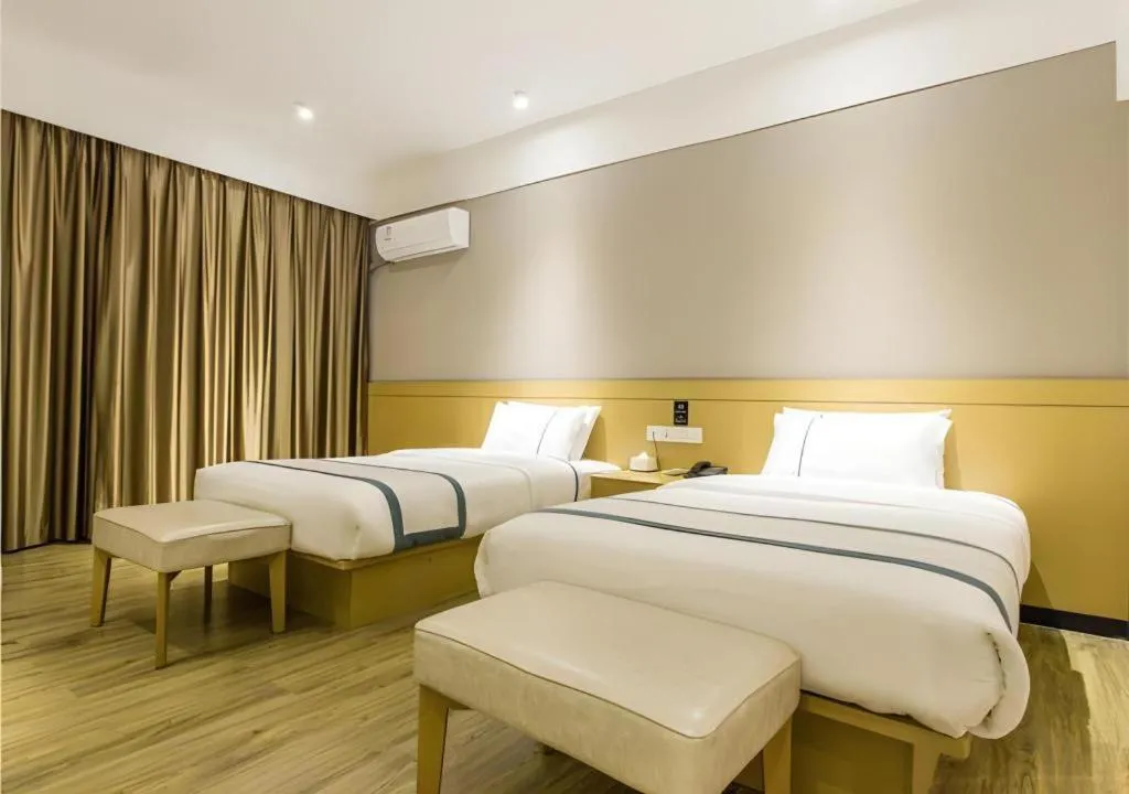 Bed in City Comfort Inn Liuzhou Liunan Wanda Plaza