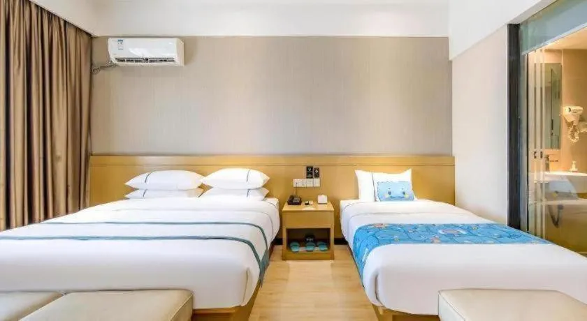 Bed in City Comfort Inn Liuzhou Liunan Wanda Plaza