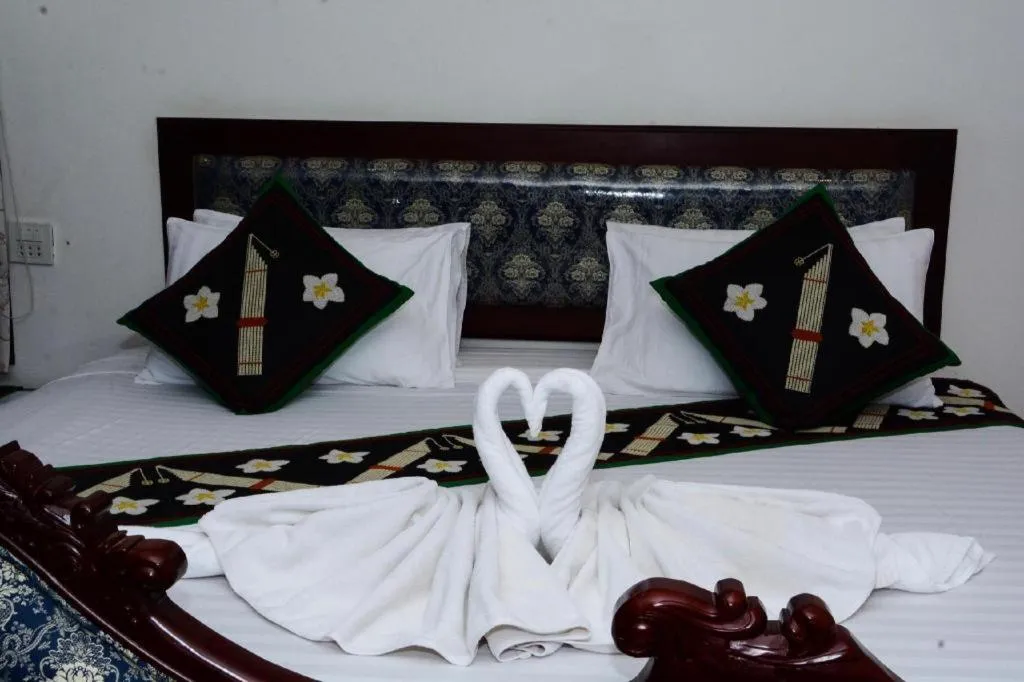 Bed in Anoulack Khen Lao Hotel