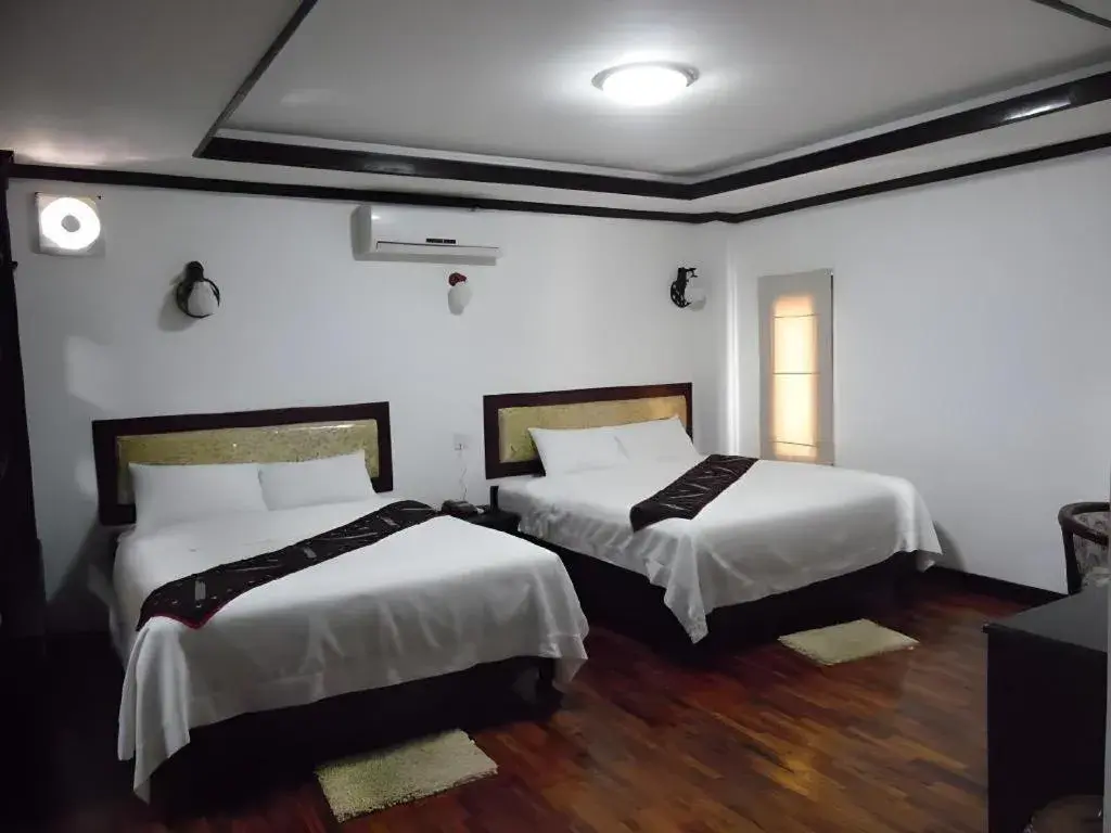 Bed in Anoulack Khen Lao Hotel Bed in Anoulack Khen Lao Hotel