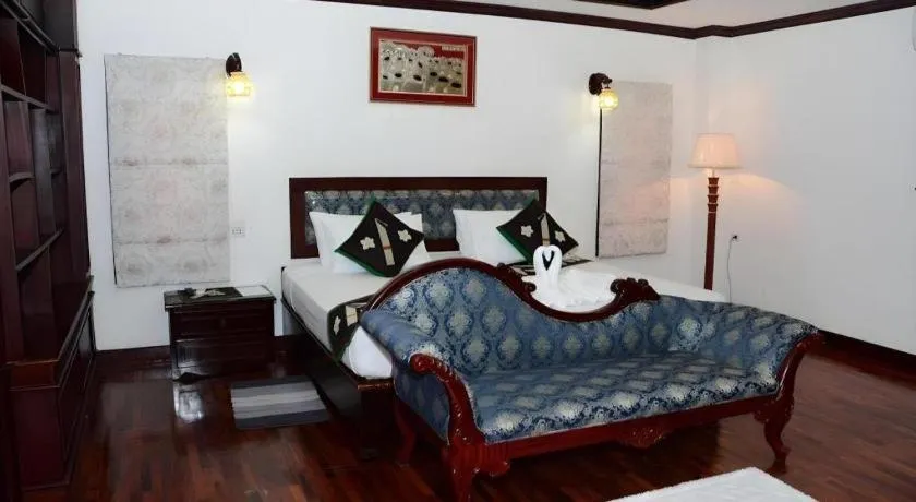 Bed in Anoulack Khen Lao Hotel