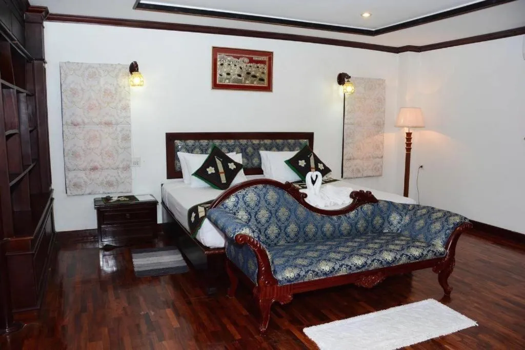 Bed in Anoulack Khen Lao Hotel