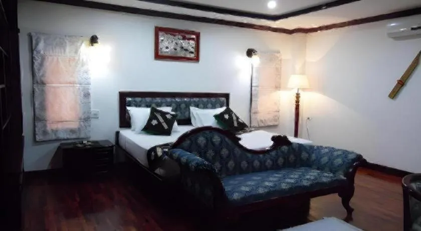 Bed in Anoulack Khen Lao Hotel