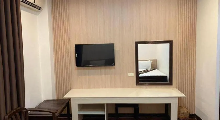 Bed in Anoulack Khen Lao Hotel