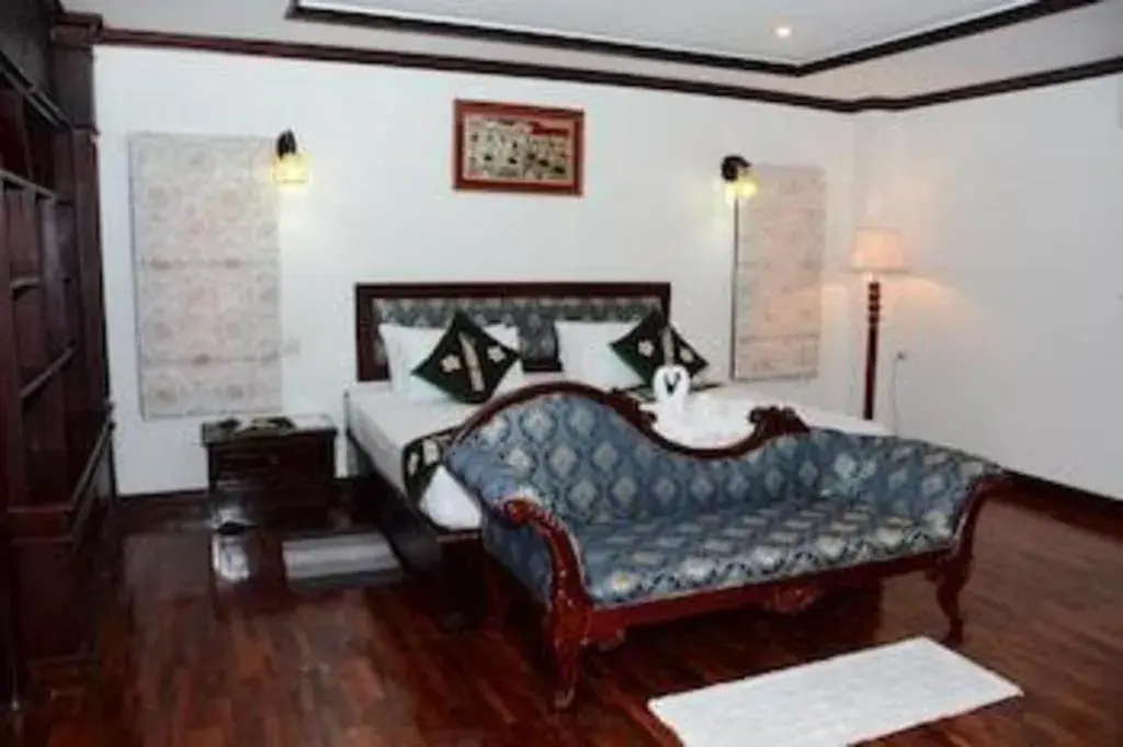 Bed in Anoulack Khen Lao Hotel Bed in Anoulack Khen Lao Hotel