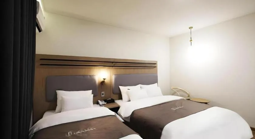 Bed in Hotel Urban Brown