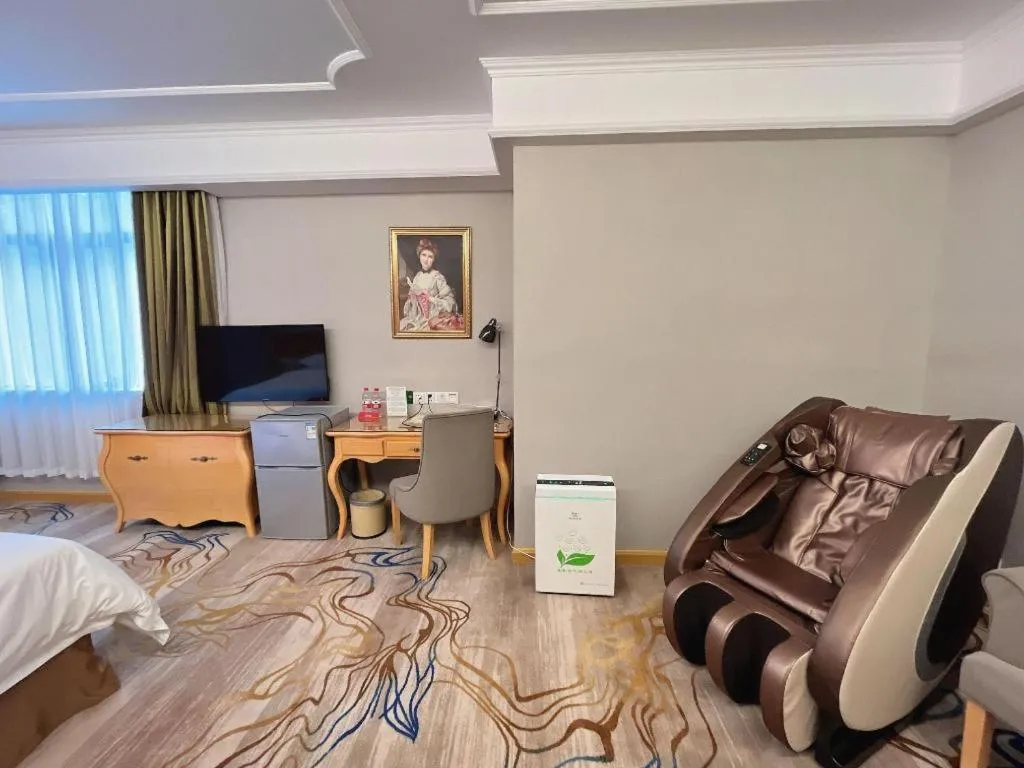 Bed in Vienna Hotel Shenzhen Longgang Dayun Center Branch
