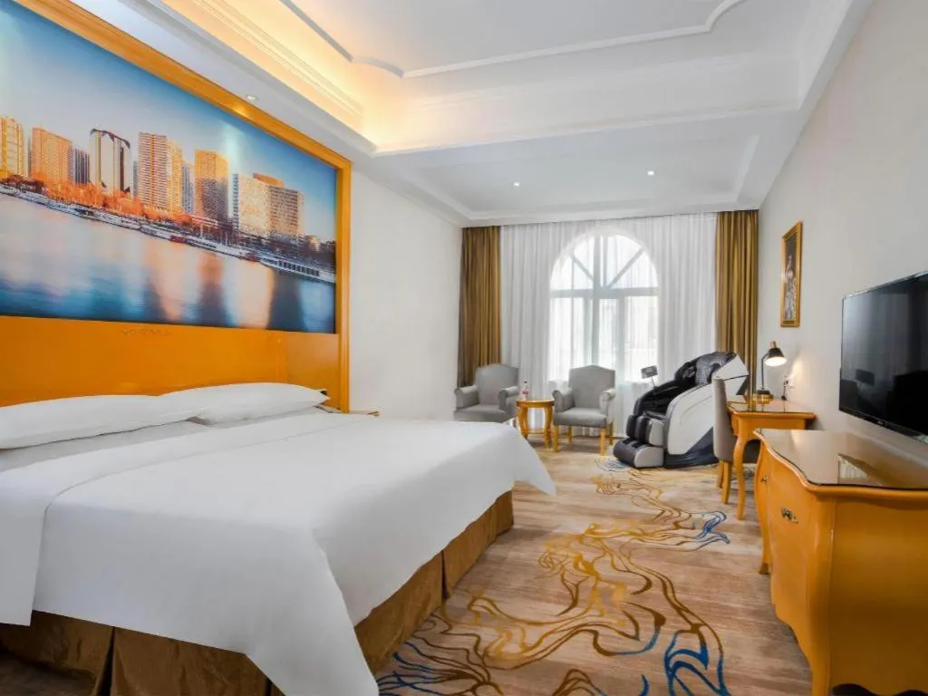 Bed in Vienna Hotel Shenzhen Longgang Dayun Center Branch