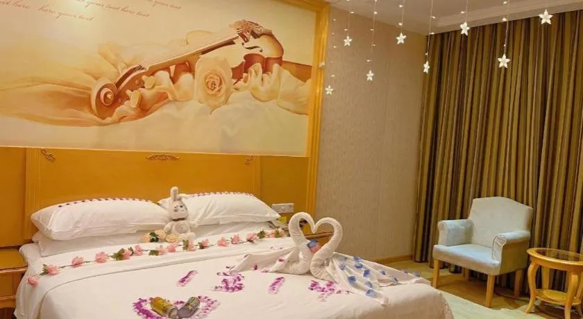 Bed in Vienna Hotel Shenzhen Longgang Dayun Center Branch