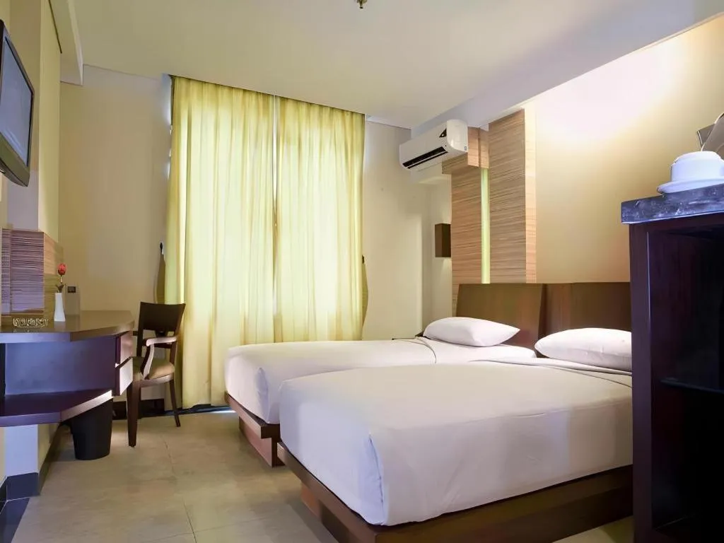 Bed in Losari Roxy Hotel Jakarta