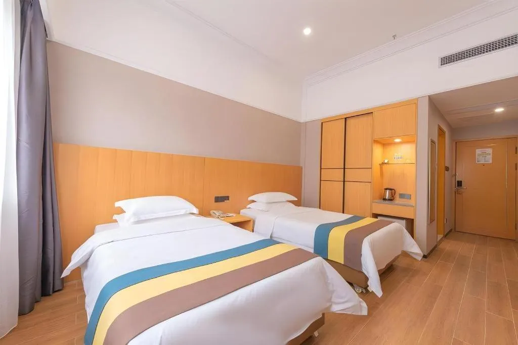 Bed in Carrianna Hotel