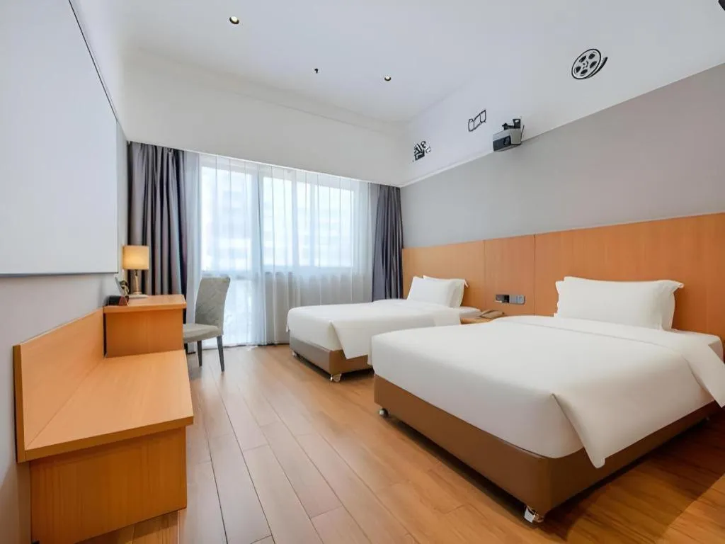 Bed in Carrianna Hotel