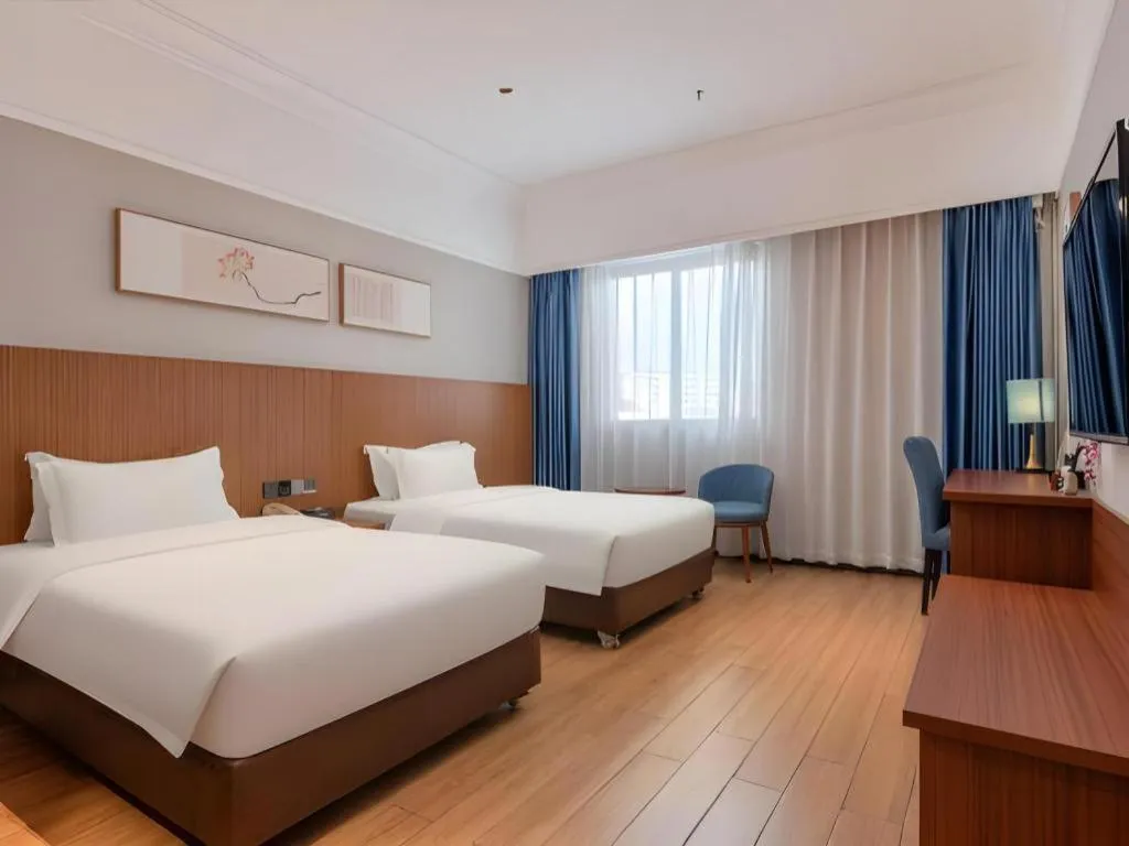 Bed in Carrianna Hotel