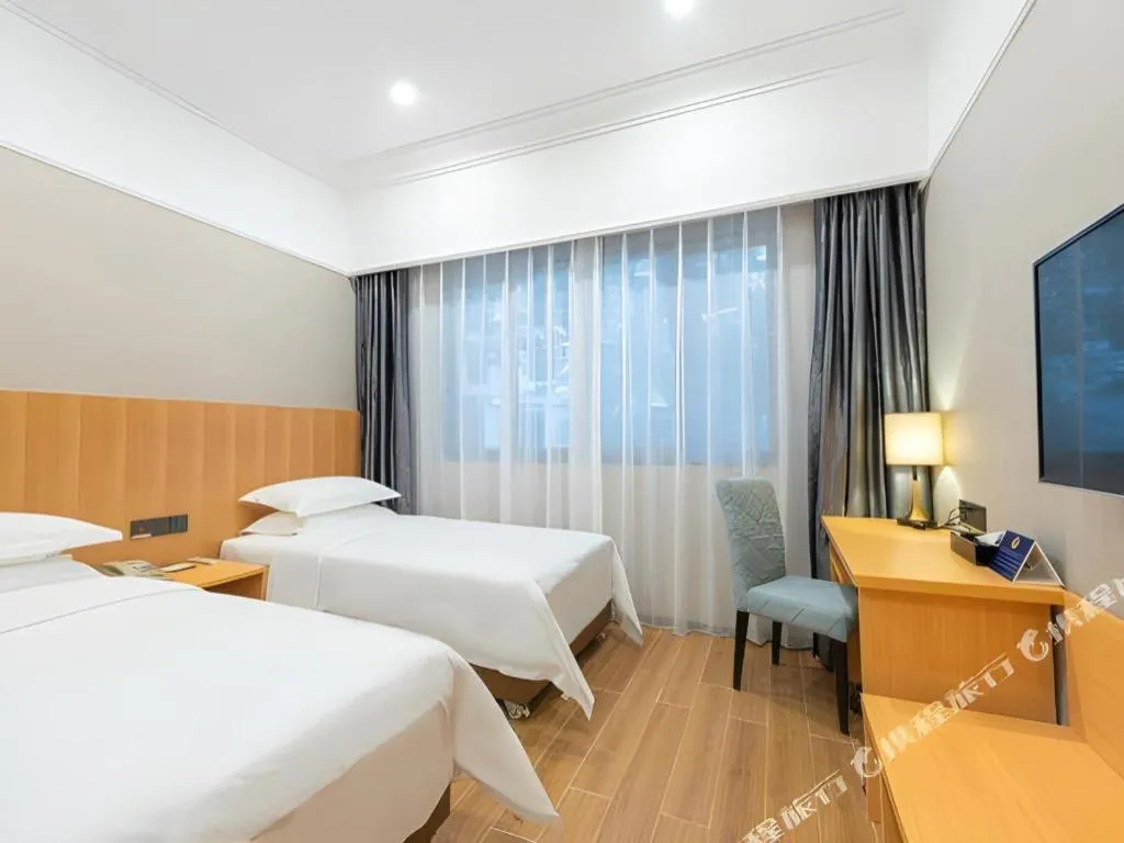 Bed in Carrianna Hotel