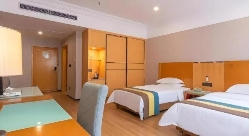 Bed in Carrianna Hotel