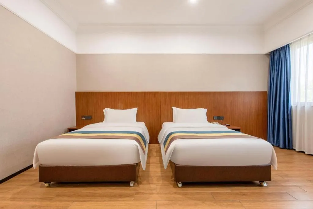 Bed in Carrianna Hotel