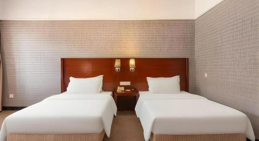 Bed in Carrianna Hotel