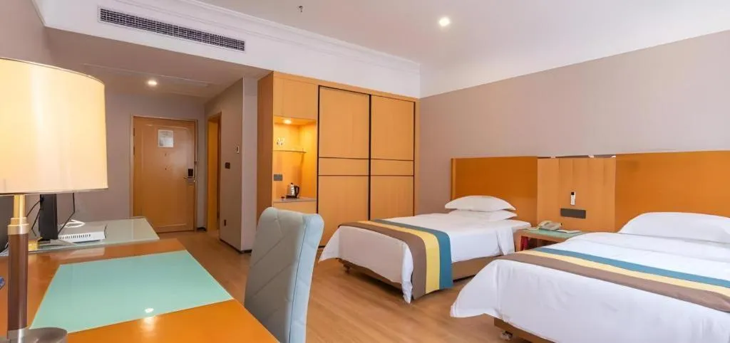 Bed in Carrianna Hotel