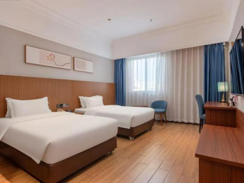 Bed in Carrianna Hotel