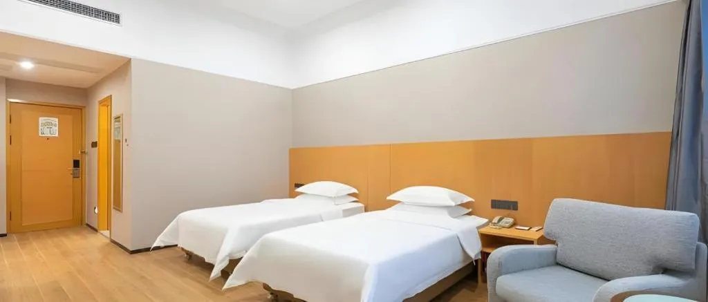 Bed in Carrianna Hotel